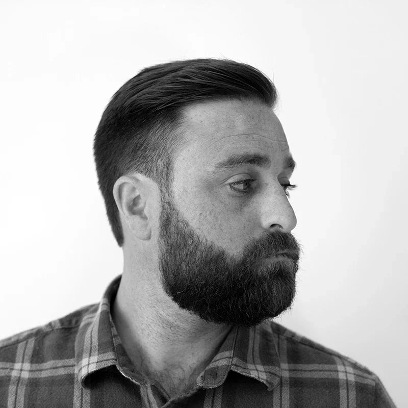 Man with messy pomp hairstyle